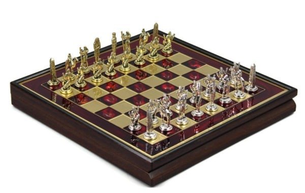 red frames metal chess board with metal chess pieces