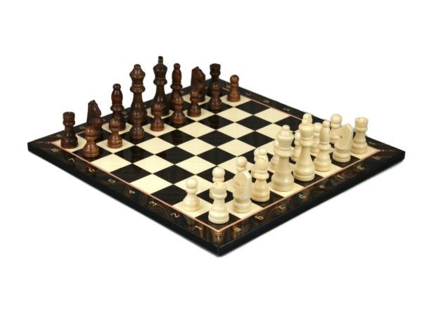 walnut chess board and brown chess pieces