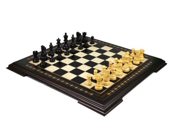 black mother of pearl chess board with ebonised classic staunton chess pieces