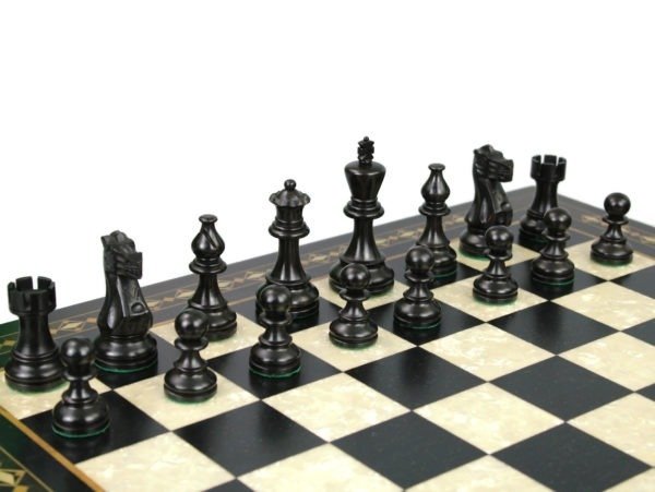eobnised classic staunton chess pieces on mother of pearl chess board