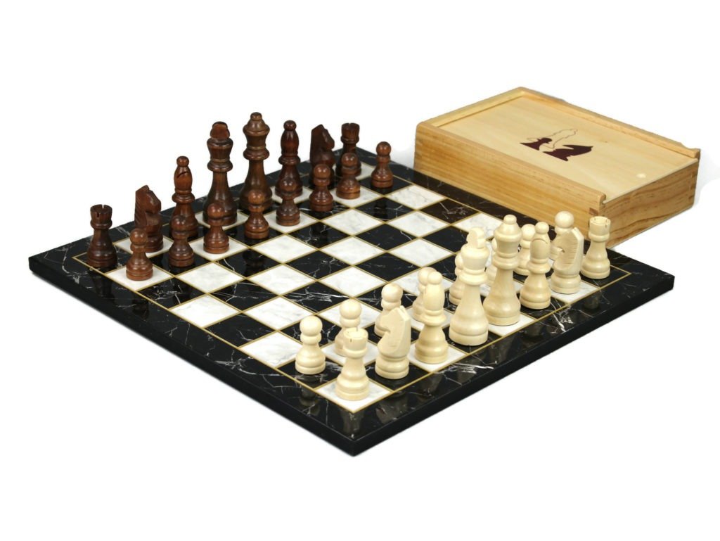 black marble chess set with chess pieces and storage box