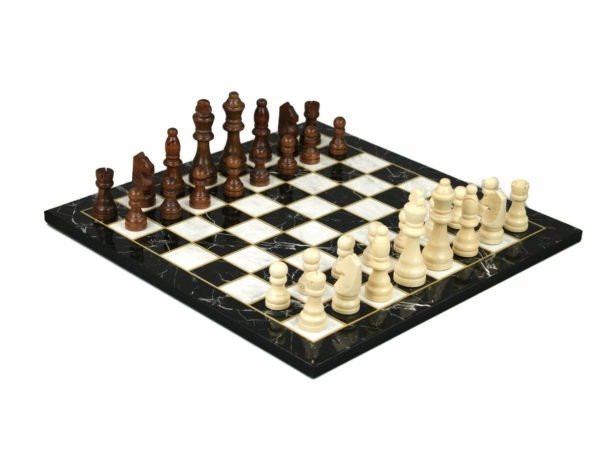 black marble chess board with brown chess pieces