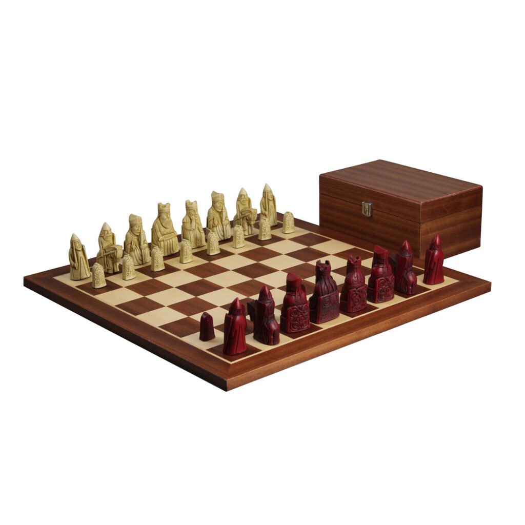 mahogany chess board with red isle of lewis chess pieces and mahogany chess box