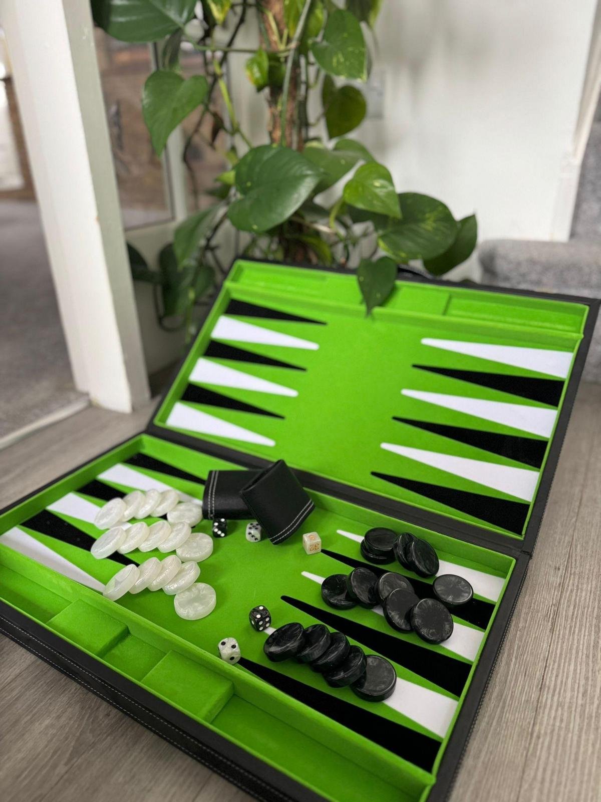 Hyperrealistic image of intense backgammon match in elegant gaming room.